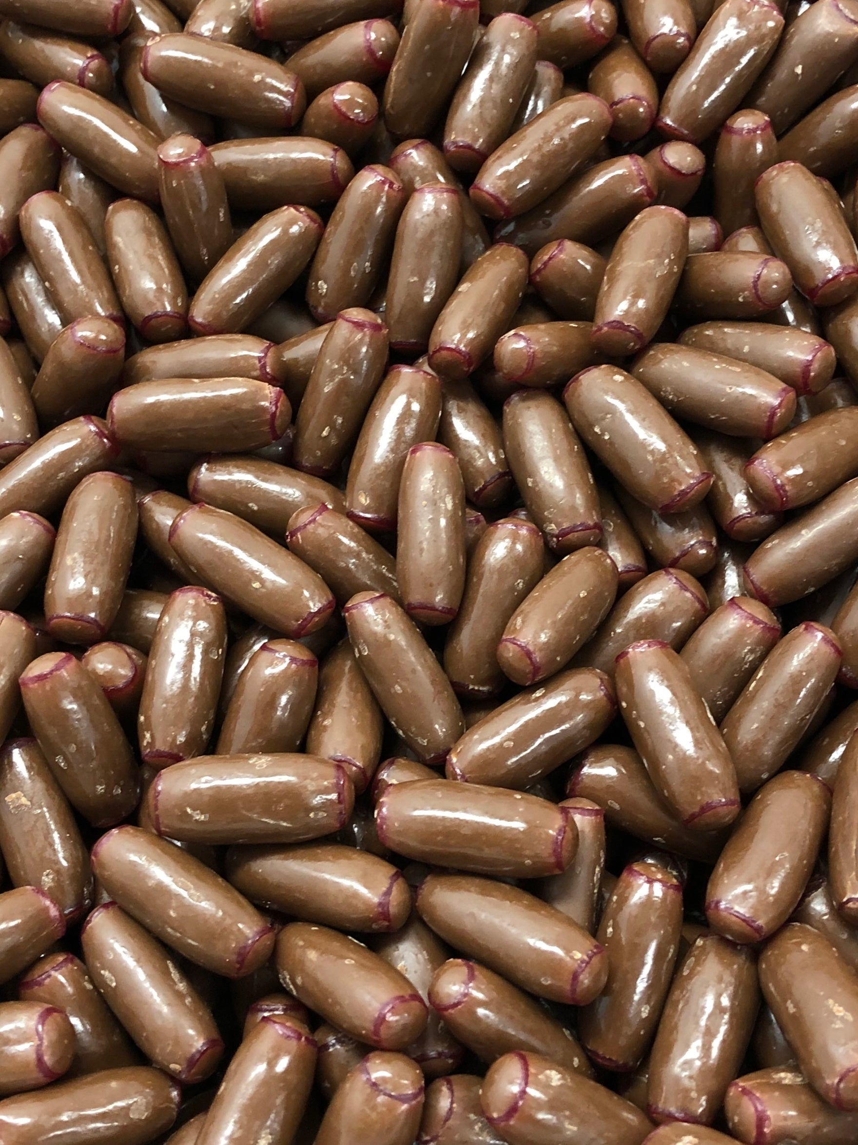 Fyna Raspberry Bullets Fyna Milk Choc Rasp Bullets x 6.5kg – Horse Torque & Lollies